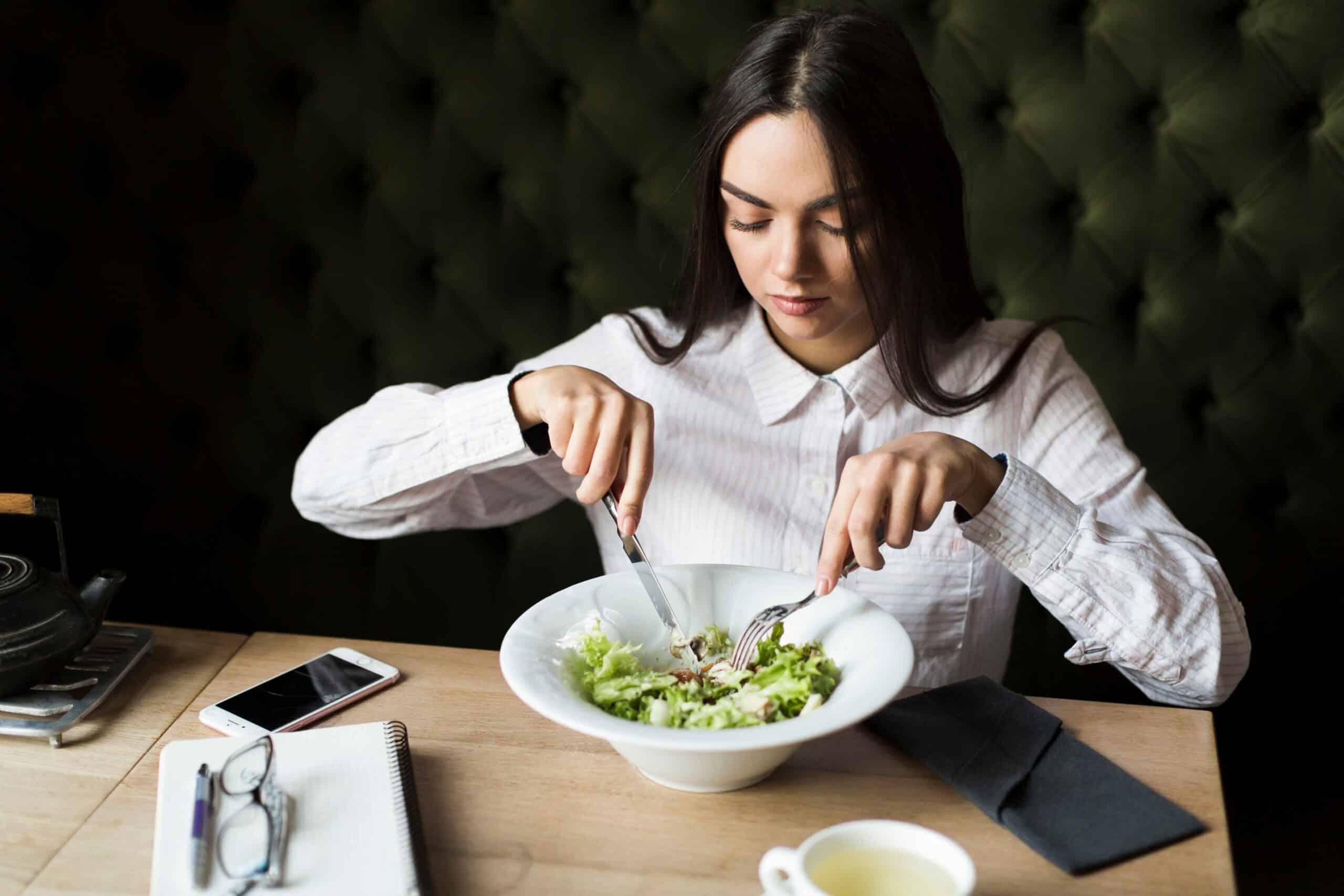 young-woman-having-salad-lunch (1)