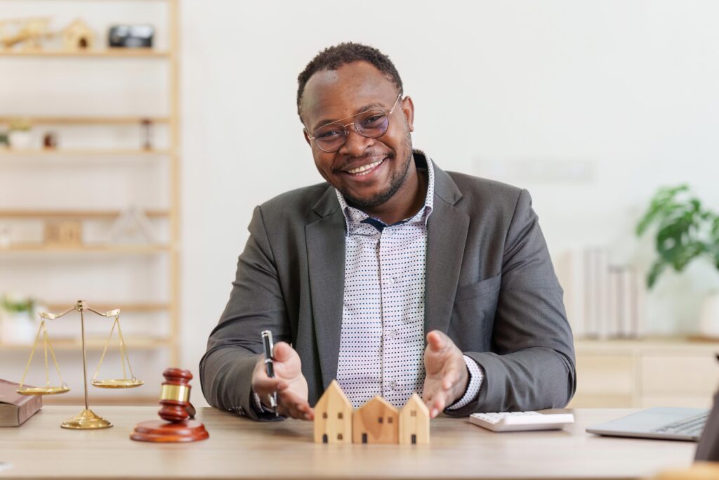 American African Lawyer or Real Estate Agent explain insurance detail to client, to legally for the purchase, mortgage and rental of real estate