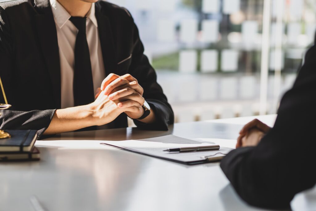 What to Do in the First 90 Days After Separation in Australia 3 Formal Meeting in a Bright Office Setting