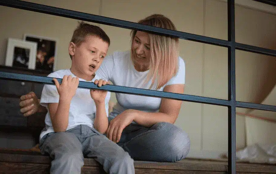 AFL mother taking care of her autistic son at home 1 .png