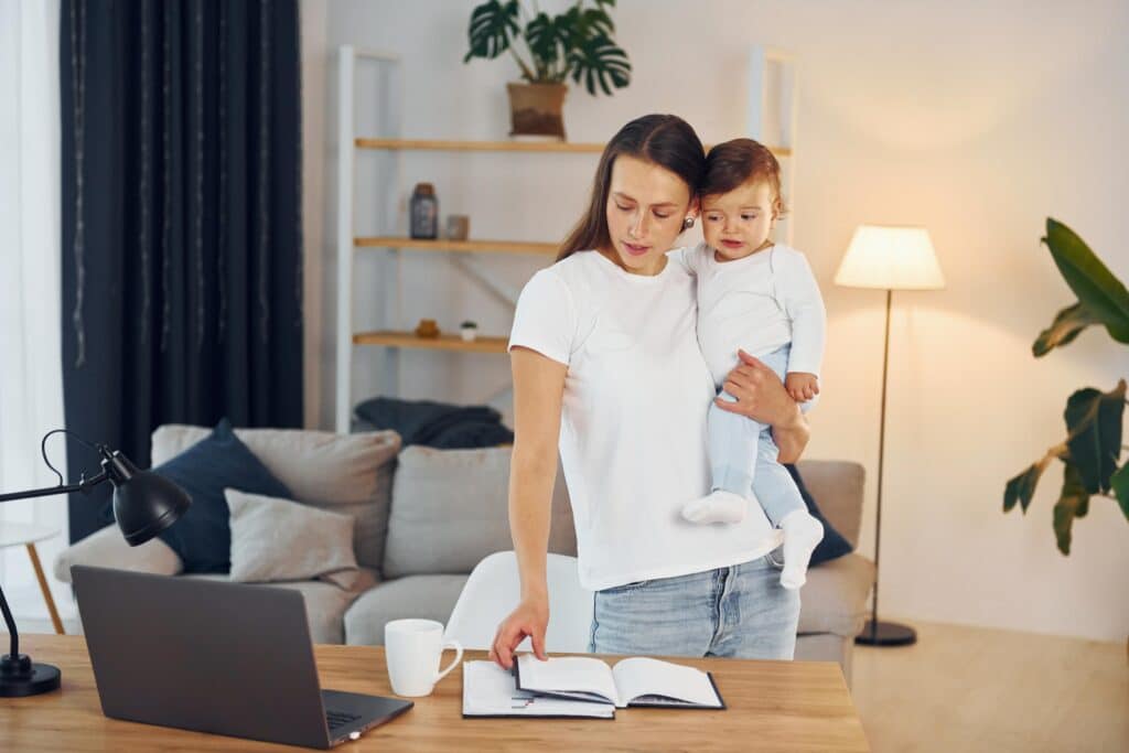 Mother and Baby Working from Home Together