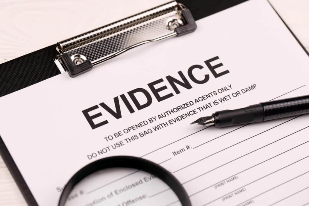 Evidence Document on a Clipboard with Magnifying Glass